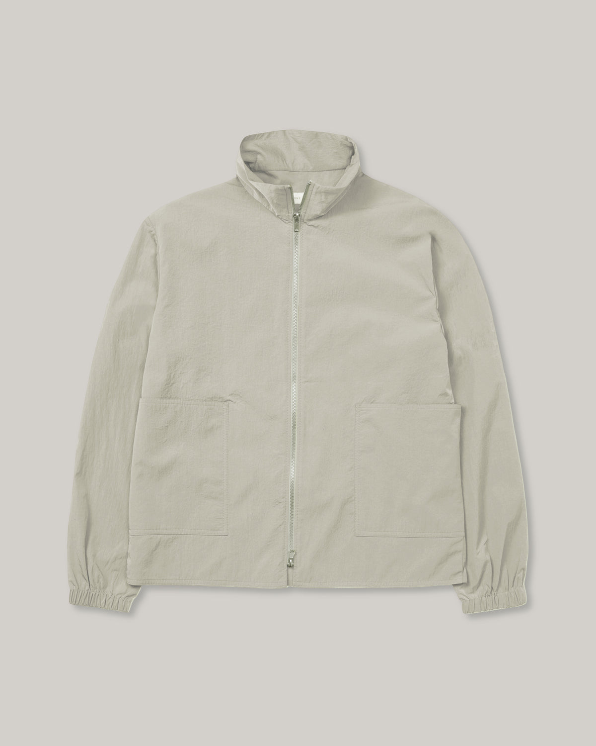 WORKS AND DAYS - NYLON TRAINING ZIP JACKET - LIGHT KHAKI